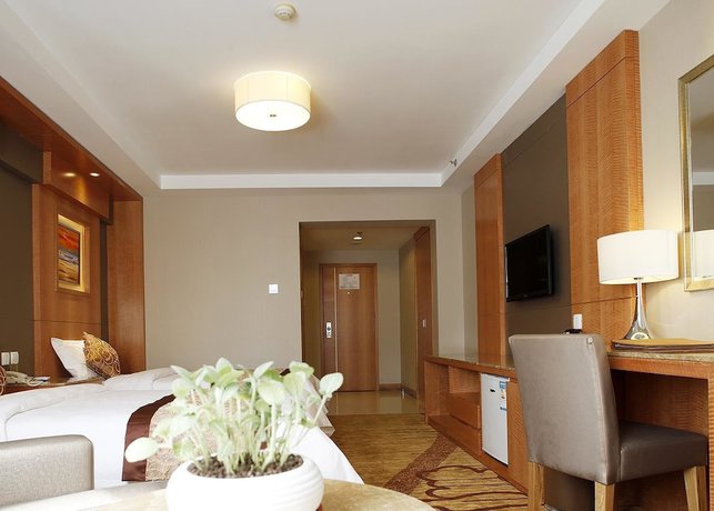 Imagen de la habitación del Hotel Beijing Fuyoujie Hotel. Foto 10