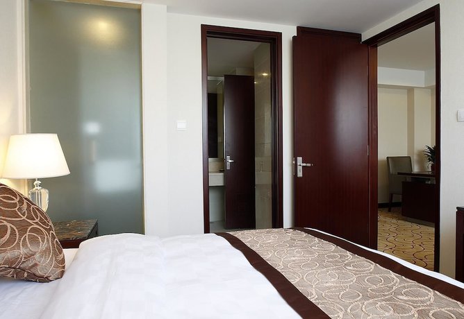 Imagen de la habitación del Hotel Beijing Fuyoujie Hotel. Foto 11