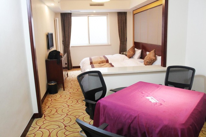 Imagen de la habitación del Hotel Beijing Fuyoujie Hotel. Foto 14