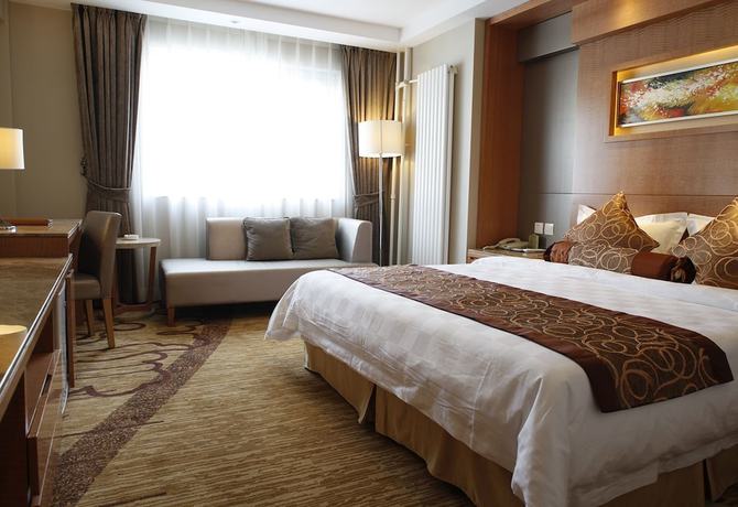 Imagen de la habitación del Hotel Beijing Fuyoujie Hotel. Foto 16