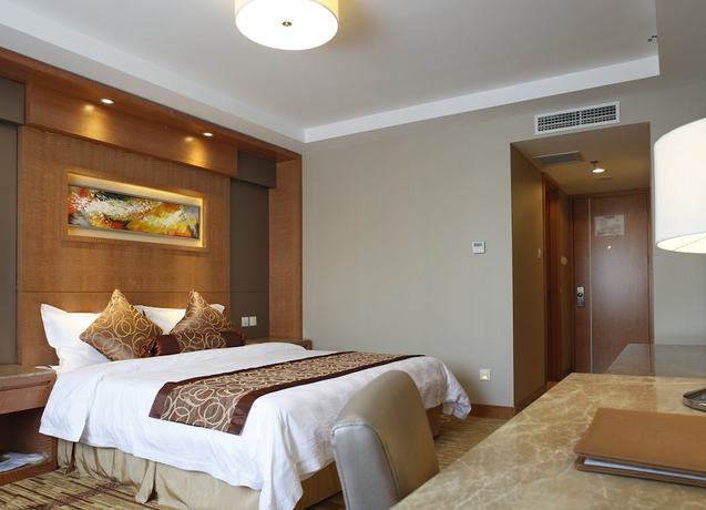 Imagen de la habitación del Hotel Beijing Fuyoujie Hotel. Foto 19