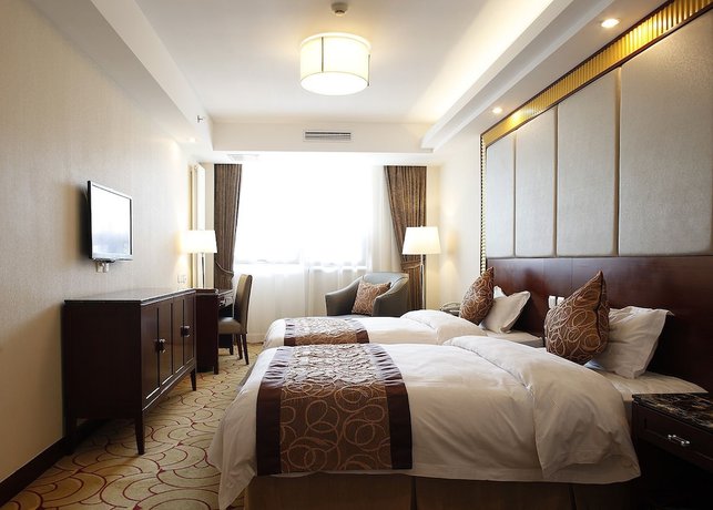 Imagen de la habitación del Hotel Beijing Fuyoujie Hotel. Foto 20