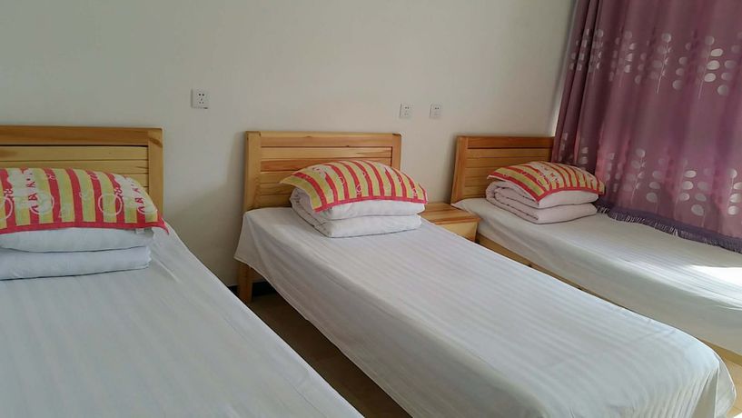 Imagen de la habitación del Hotel Beijing Great Wall Hemei Boutique. Foto 2