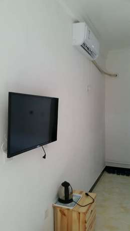 Imagen de la habitación del Hotel Beijing Great Wall Hemei Boutique. Foto 4