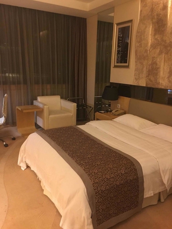 Imagen de la habitación del Hotel Beijing Guangming. Foto 15