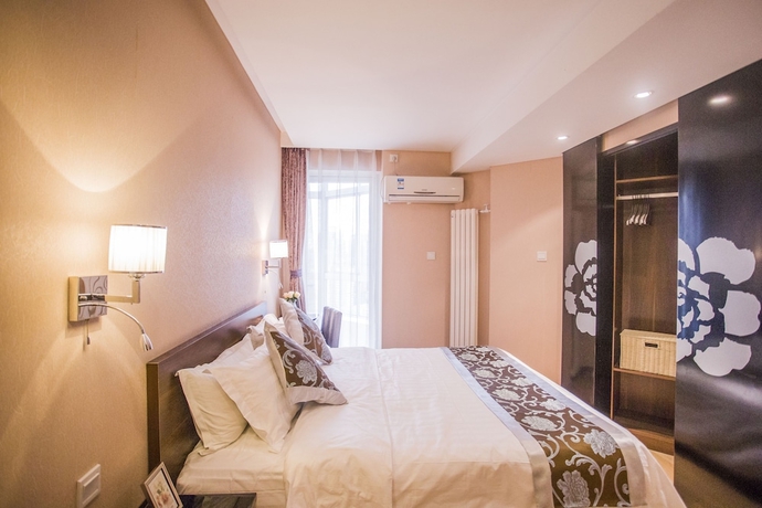 Imagen de la habitación del Hotel Beijing Guangyao Service Apartment Chaoyangmen. Foto 6