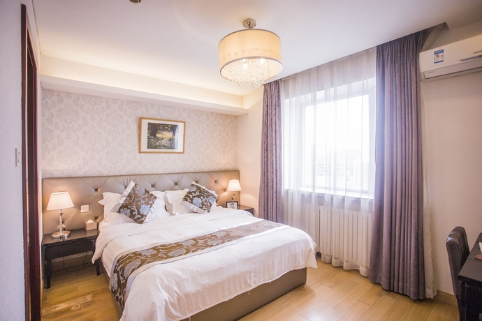 Imagen de la habitación del Hotel Beijing Guangyao Service Apartment Chaoyangmen. Foto 9