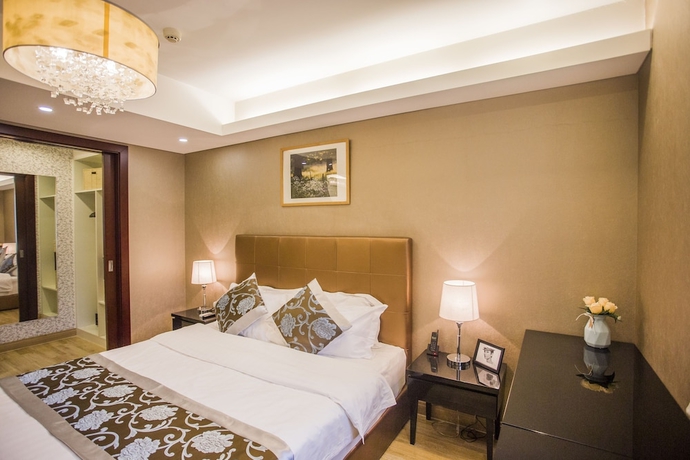 Imagen de la habitación del Hotel Beijing Guangyao Service Apartment Chaoyangmen. Foto 11