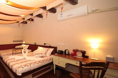 Imagen de la habitación del Hotel Beijing Gubei Water Town Changcheng Inn. Foto 3