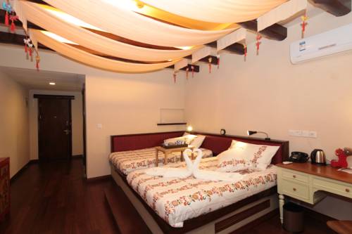 Imagen de la habitación del Hotel Beijing Gubei Water Town Changcheng Inn. Foto 6