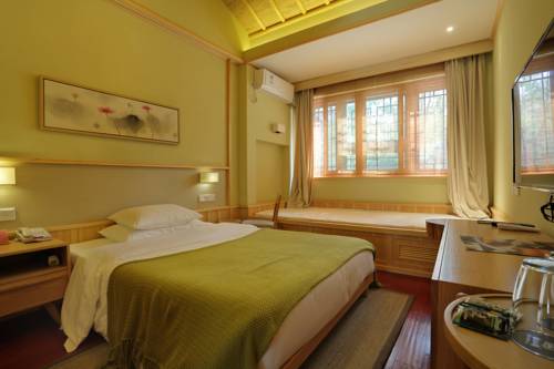 Imagen de la habitación del Hotel Beijing Gubei Water Town Duanjia Inn. Foto 3