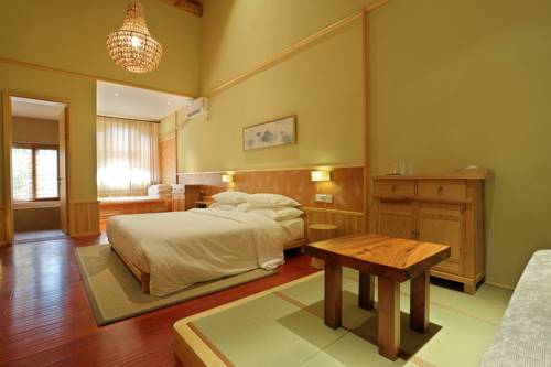 Imagen de la habitación del Hotel Beijing Gubei Water Town Duanjia Inn. Foto 4
