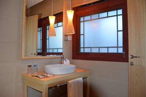 Imagen de la habitación del Hotel Beijing Gubei Water Town Duanjia Inn. Foto 6