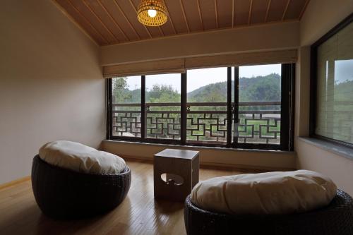 Imagen de la habitación del Hotel Beijing Gubei Water Town Royal Hot Spring Boutique Hotel. Foto 4