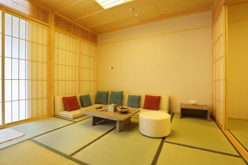 Imagen de la habitación del Hotel Beijing Gubei Water Town Royal Hot Spring Boutique Hotel. Foto 5