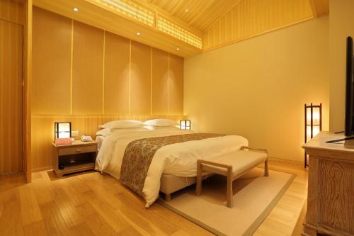 Imagen de la habitación del Hotel Beijing Gubei Water Town Royal Hot Spring Boutique Hotel. Foto 6