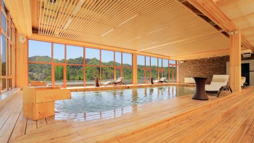 Imagen de la habitación del Hotel Beijing Gubei Water Town Royal Hot Spring Boutique Hotel. Foto 7