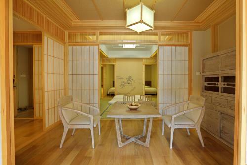 Imagen de la habitación del Hotel Beijing Gubei Water Town Royal Hot Spring Boutique Hotel. Foto 8