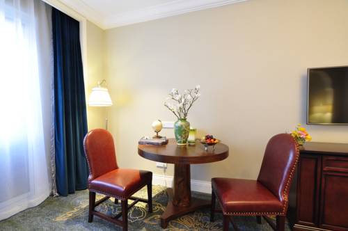 Imagen de la habitación del Hotel Beijing Gubei Water Town William Edgar. Foto 1