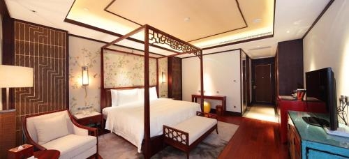 Imagen de la habitación del Hotel Beijing Gubei Water Town Wuzhenhui Boutique. Foto 8