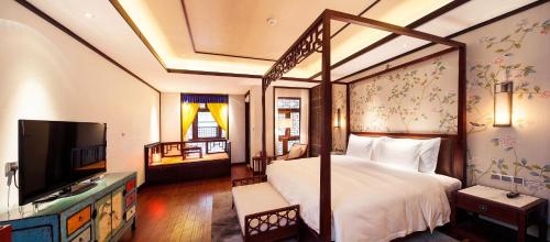 Imagen de la habitación del Hotel Beijing Gubei Water Town Wuzhenhui Boutique. Foto 9