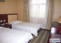 Imagen de la habitación del Hotel Beijing Guo Men Business Hotel. Foto 2