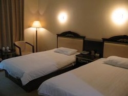 Imagen de la habitación del Hotel Beijing Guo Men Business Hotel. Foto 3