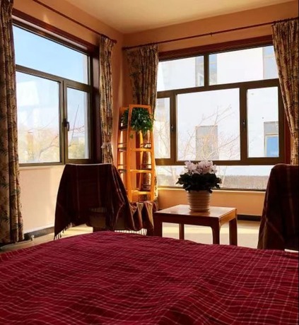 Imagen de la habitación del Hotel Beijing Habitat Gardens Inn. Foto 19