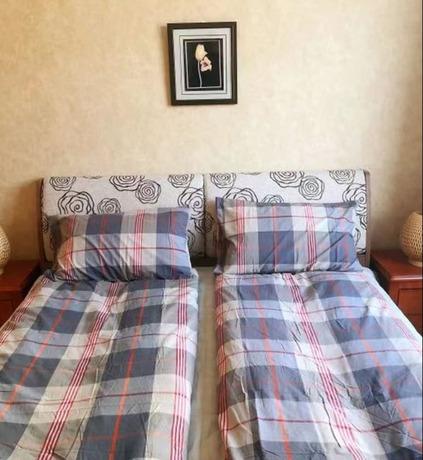 Imagen de la habitación del Hotel Beijing Habitat Gardens Inn. Foto 20