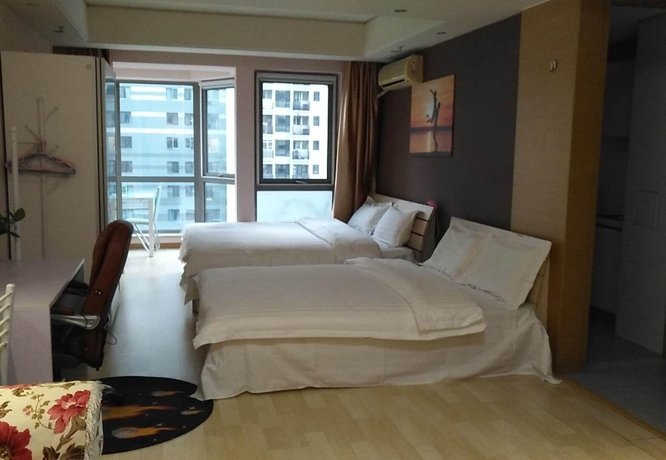Imagen de la habitación del Hotel Beijing Haohan Boutique Aparthotel. Foto 4
