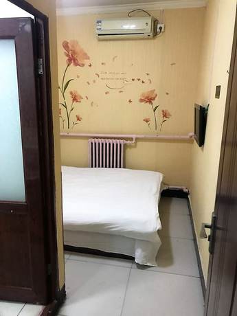 Imagen de la habitación del Hotel Beijing Huairou Pan Jia Yuan. Foto 11