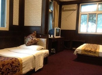 Imagen de la habitación del Hotel Beijing Huiqiang Hotel. Foto 4