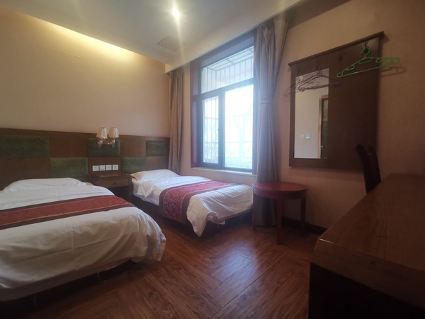 Imagen de la habitación del Hotel Beijing Huiqing Garden Bussiness. Foto 2