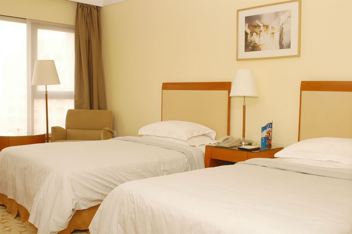 Imagen de la habitación del Hotel Beijing International. Foto 4