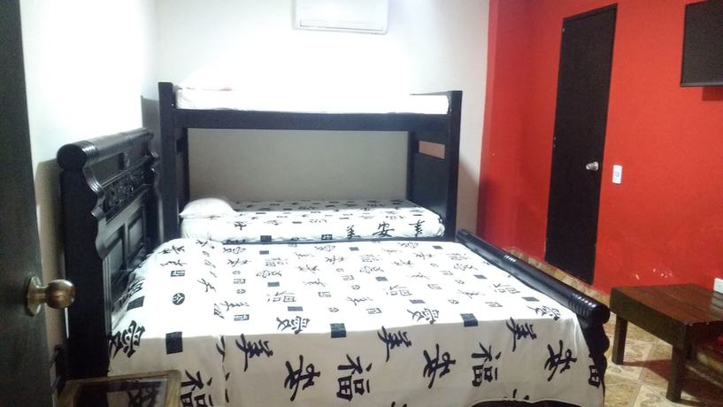 Imagen de la habitación del Hotel Beijing International, Isla de Tierra Bomba. Foto 7