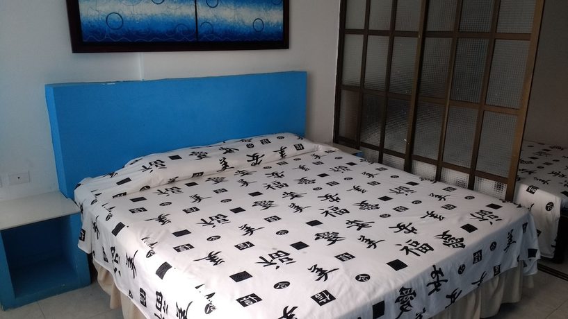 Imagen de la habitación del Hotel Beijing International, Isla de Tierra Bomba. Foto 11