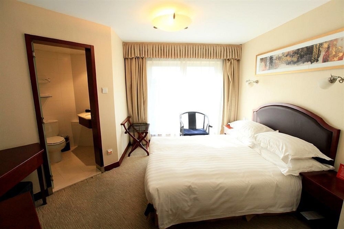 Imagen de la habitación del Hotel Beijing Landmark Hotel. Foto 4