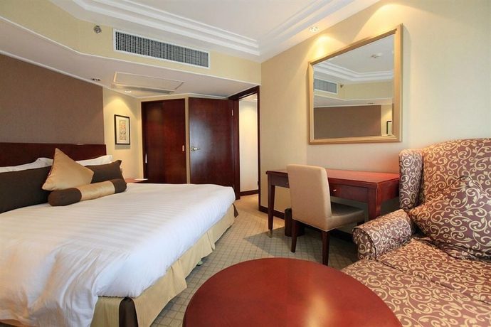 Imagen de la habitación del Hotel Beijing Landmark Hotel. Foto 11