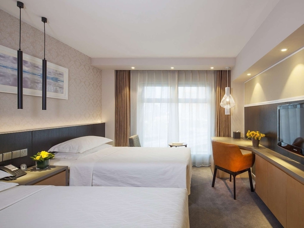 Imagen de la habitación del Hotel Beijing Landmark Hotel. Foto 16