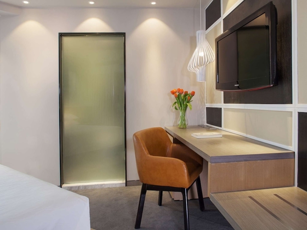 Imagen de la habitación del Hotel Beijing Landmark Hotel. Foto 17