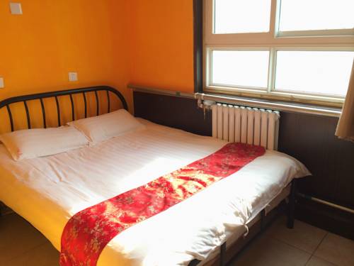 Imagen de la habitación del Hotel Beijing Leo Courtyard. Foto 4