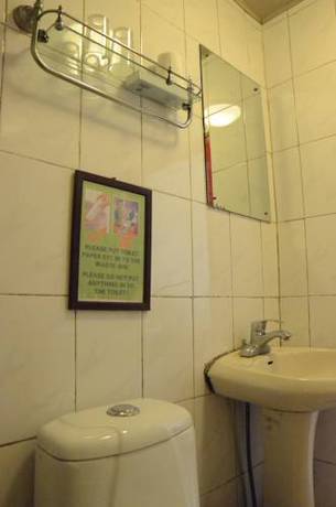 Imagen de la habitación del Hotel Beijing Leo Courtyard. Foto 5