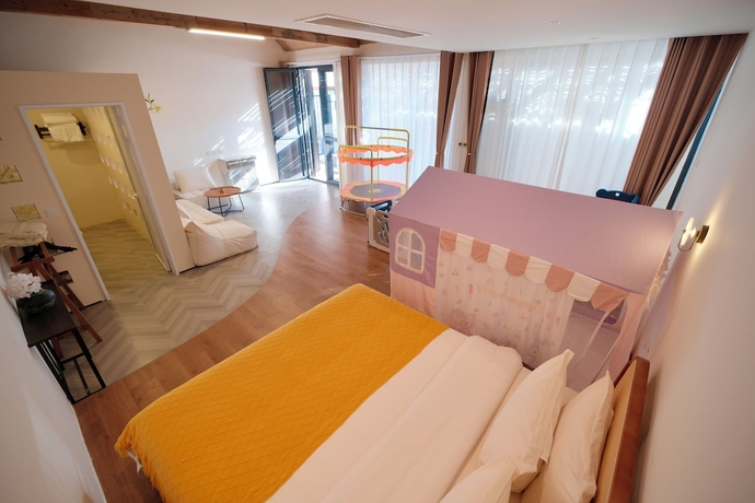 Imagen de la habitación del Hotel Beijing Mantaba Resort Homestay. Foto 7