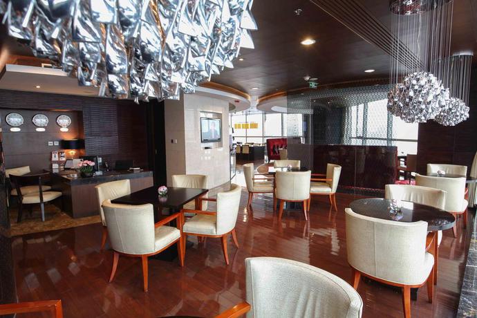 Imagen del bar/restaurante del Hotel Beijing Marriott Northeast. Foto 3