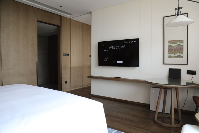 Imagen de la habitación del Hotel Beijing Marriott Yanqing. Foto 12