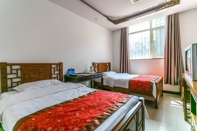 Imagen de la habitación del Hotel Beijing Mingcourtyard. Foto 3