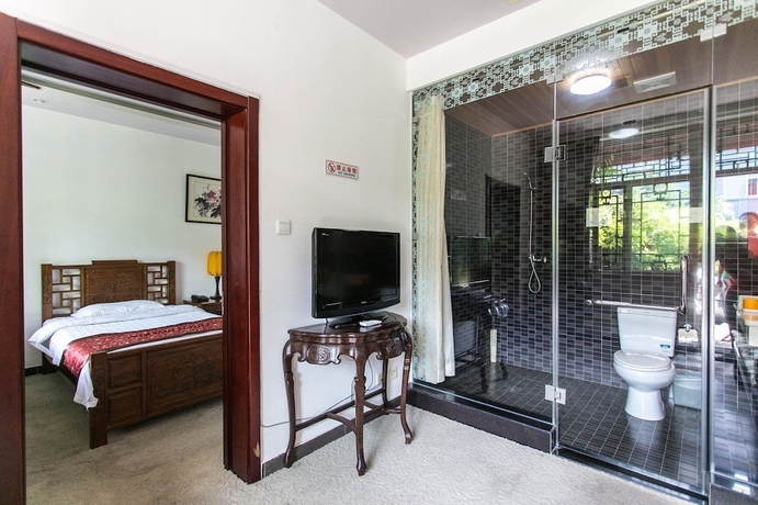 Imagen de la habitación del Hotel Beijing Mingcourtyard. Foto 4