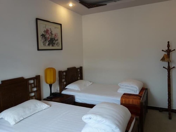 Imagen de la habitación del Hotel Beijing Mingcourtyard. Foto 5