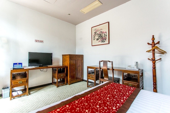 Imagen de la habitación del Hotel Beijing Mingcourtyard. Foto 11