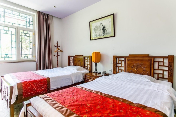 Imagen de la habitación del Hotel Beijing Mingcourtyard. Foto 12